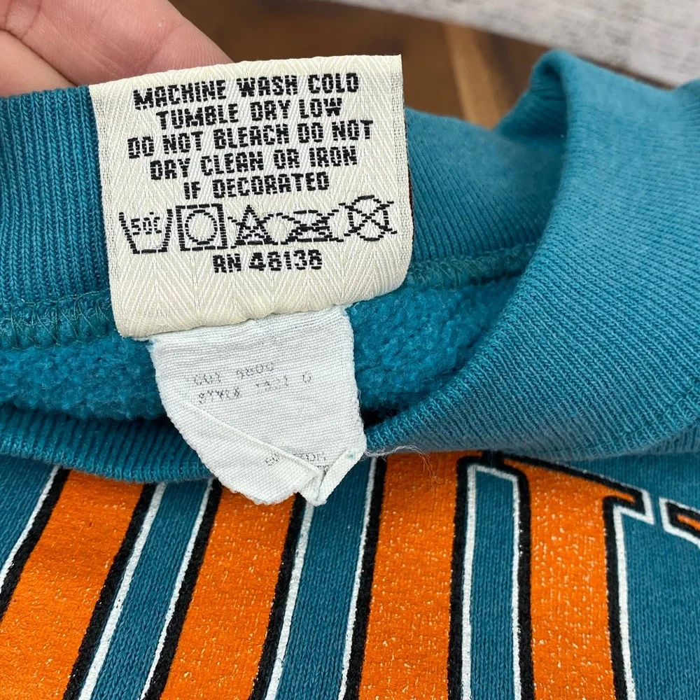 Vintage 1990s Miami Dolphins Nutmeg NFL Turquoise Orange Crewneck Sweater Mens L